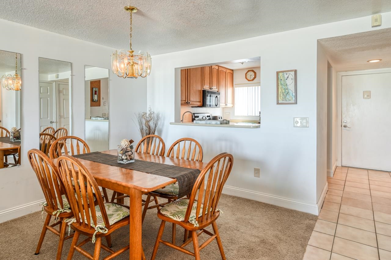 8550 A1A South, Unit 261 St. Augustine, FL 32080 - Photo 7 of 23 a view of a dining room with furniture