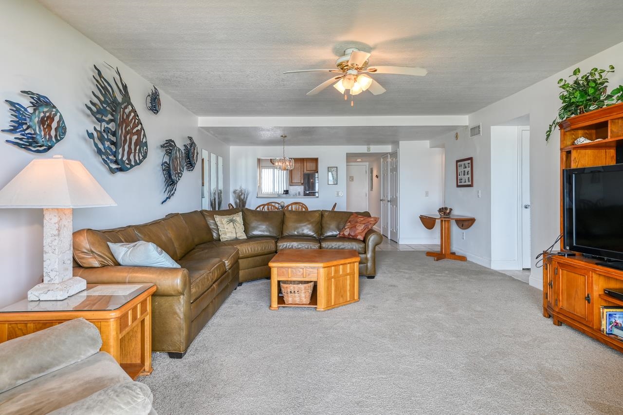 8550 A1A South, Unit 261 St. Augustine, FL 32080 - Photo 9 of 23 a living room with furniture and a flat screen tv