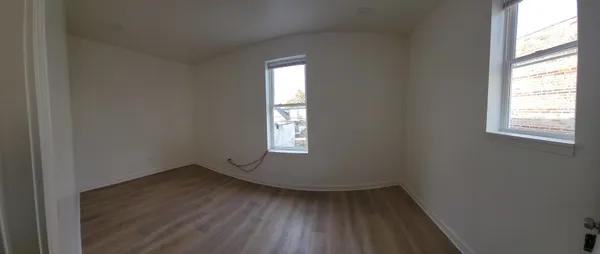 an empty room that has a window