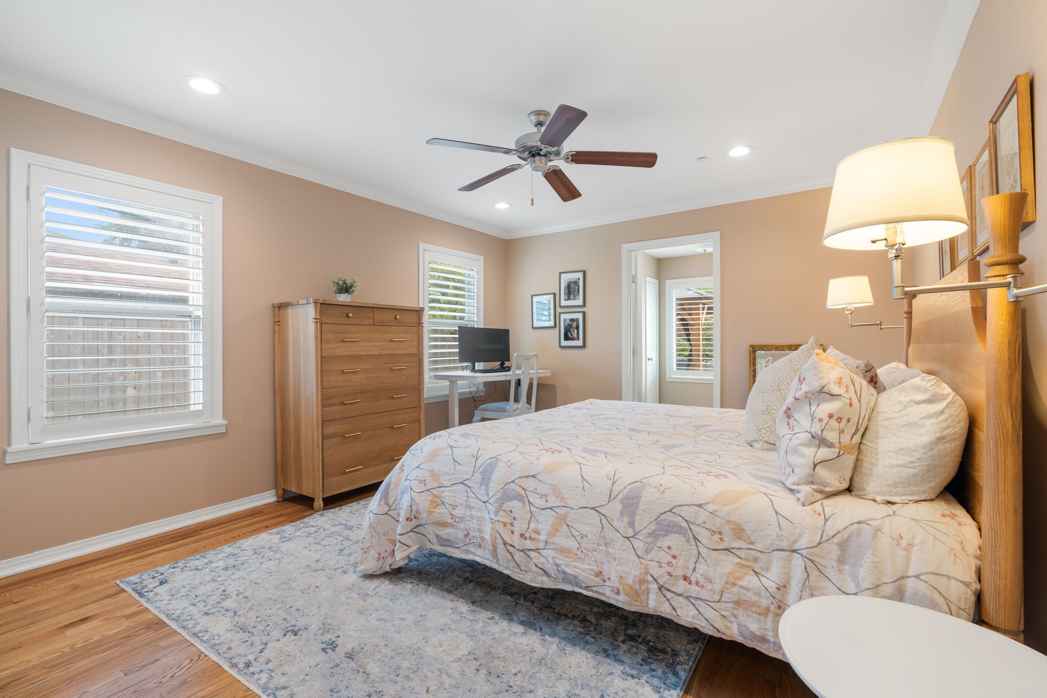 1115 Woodhill Road Houston, TX 77008 - Photo 11 of 29 Primary suite offers plenty of space with hardwoods and nice windows.
