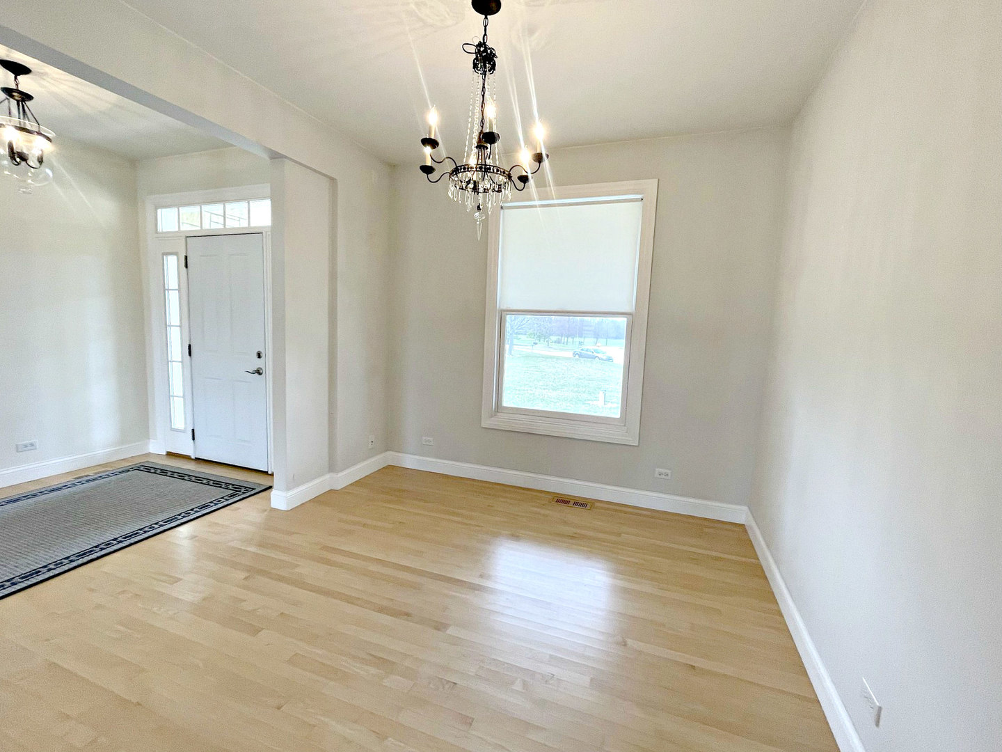 8208 Eagle Ridge Spring Grove, IL 60081 - Photo 13 of 39 wooden floor in an empty room with a window