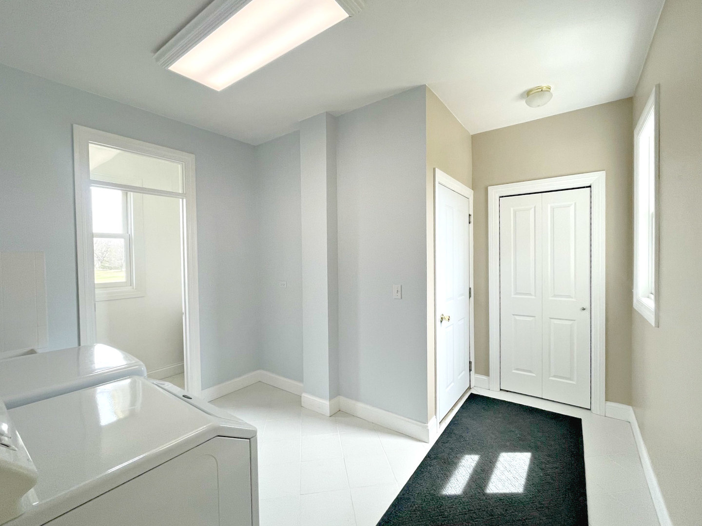 8208 Eagle Ridge Spring Grove, IL 60081 - Photo 23 of 39 a view of kitchen and hallway with window