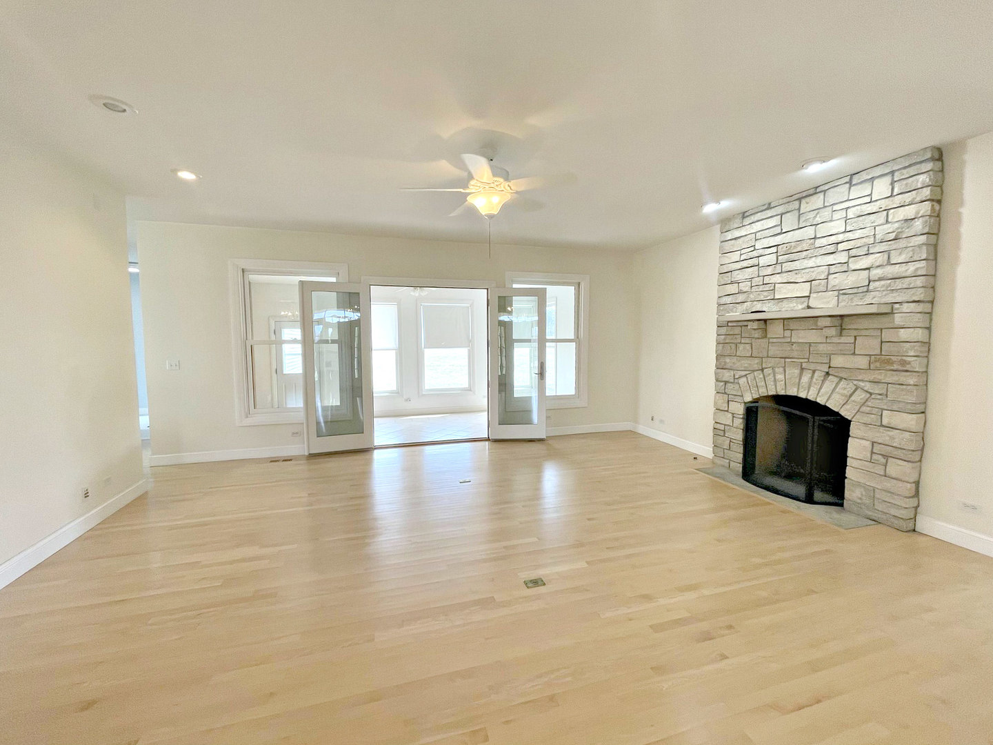 8208 Eagle Ridge Spring Grove, IL 60081 - Photo 6 of 39 a view of empty room with fireplace and windows