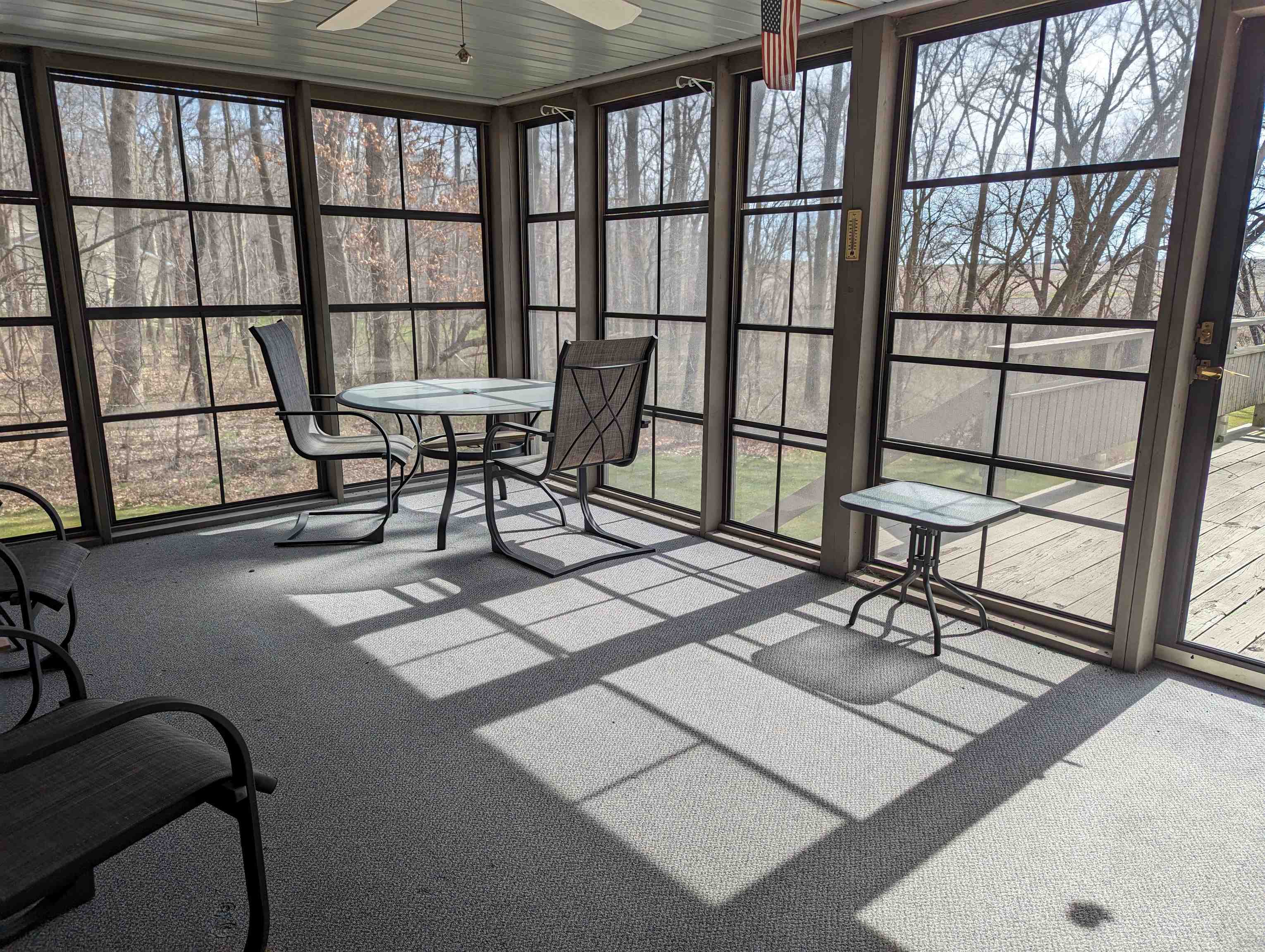 2995 West Forest Road Freeport, IL 61032 - Photo 12 of 42 a view of a chairs and table in a balcony