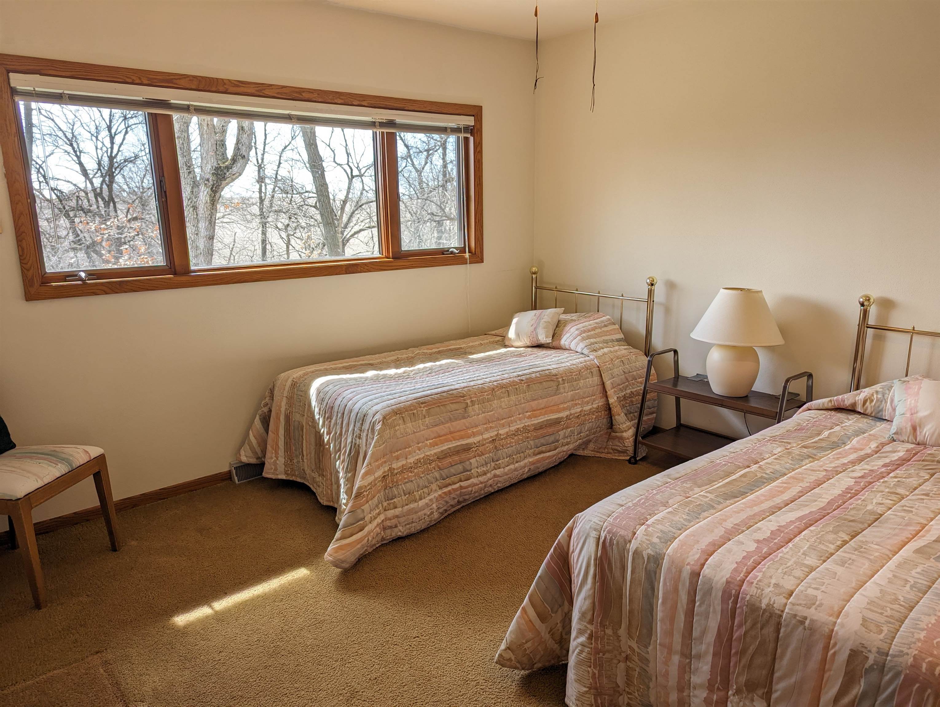 2995 West Forest Road Freeport, IL 61032 - Photo 25 of 42 a bedroom with two beds and a window