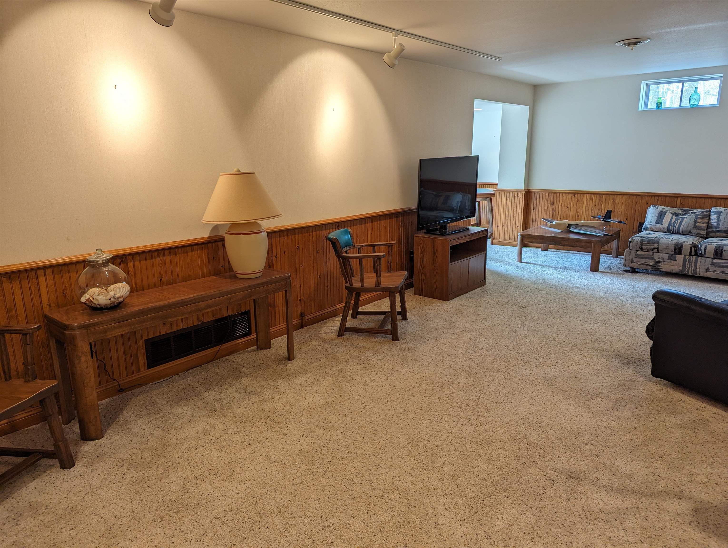 2995 West Forest Road Freeport, IL 61032 - Photo 29 of 42 a living room with furniture and a flat screen tv