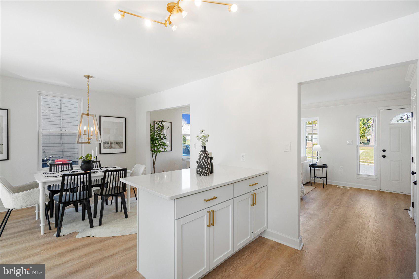 7803 Brevort Road Windsor Mill, MD 21244 - Photo 20 of 45 a view of a dining room and wooden floor