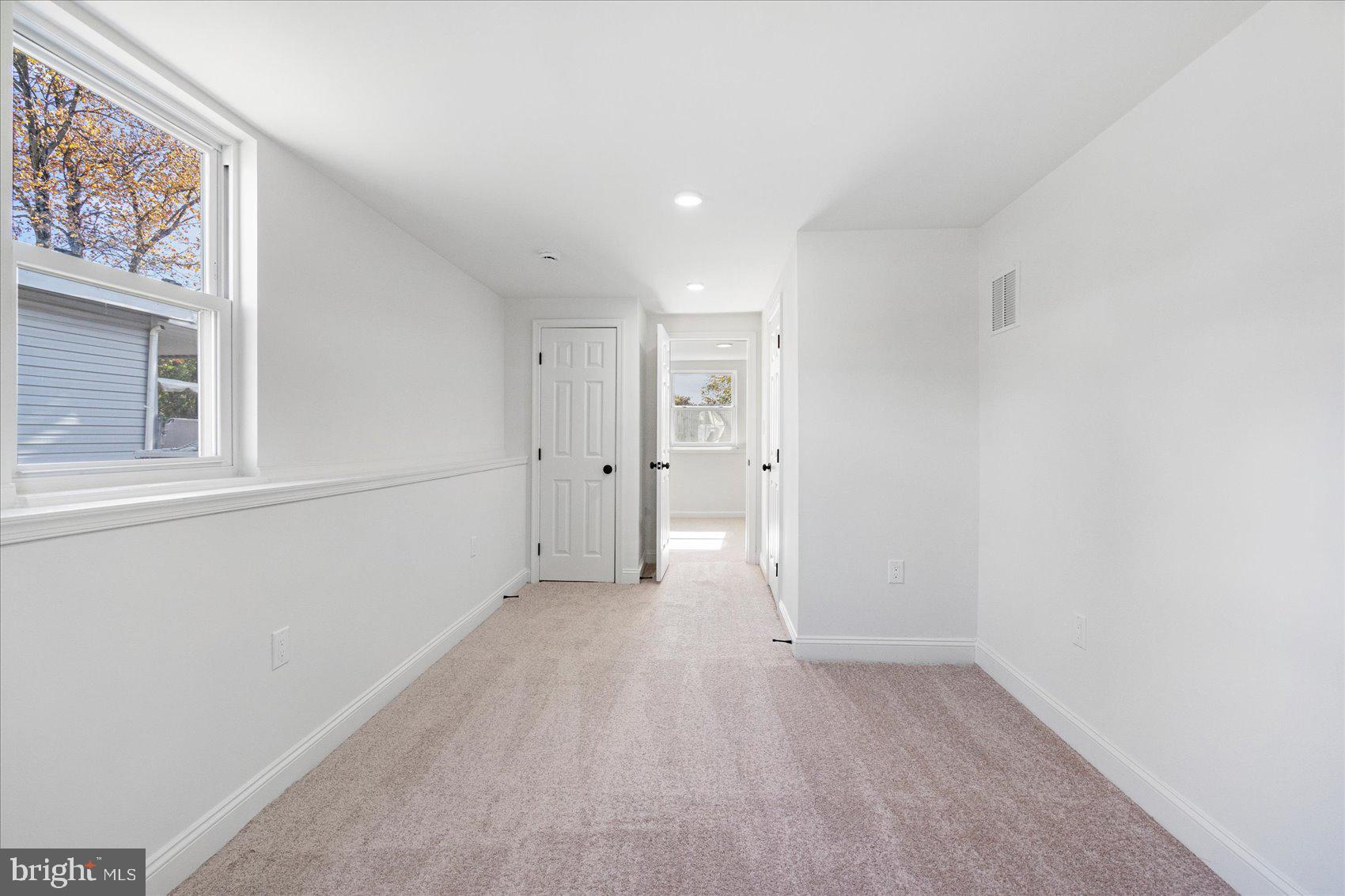 7803 Brevort Road Windsor Mill, MD 21244 - Photo 26 of 45 a view of a big room with closet and windows