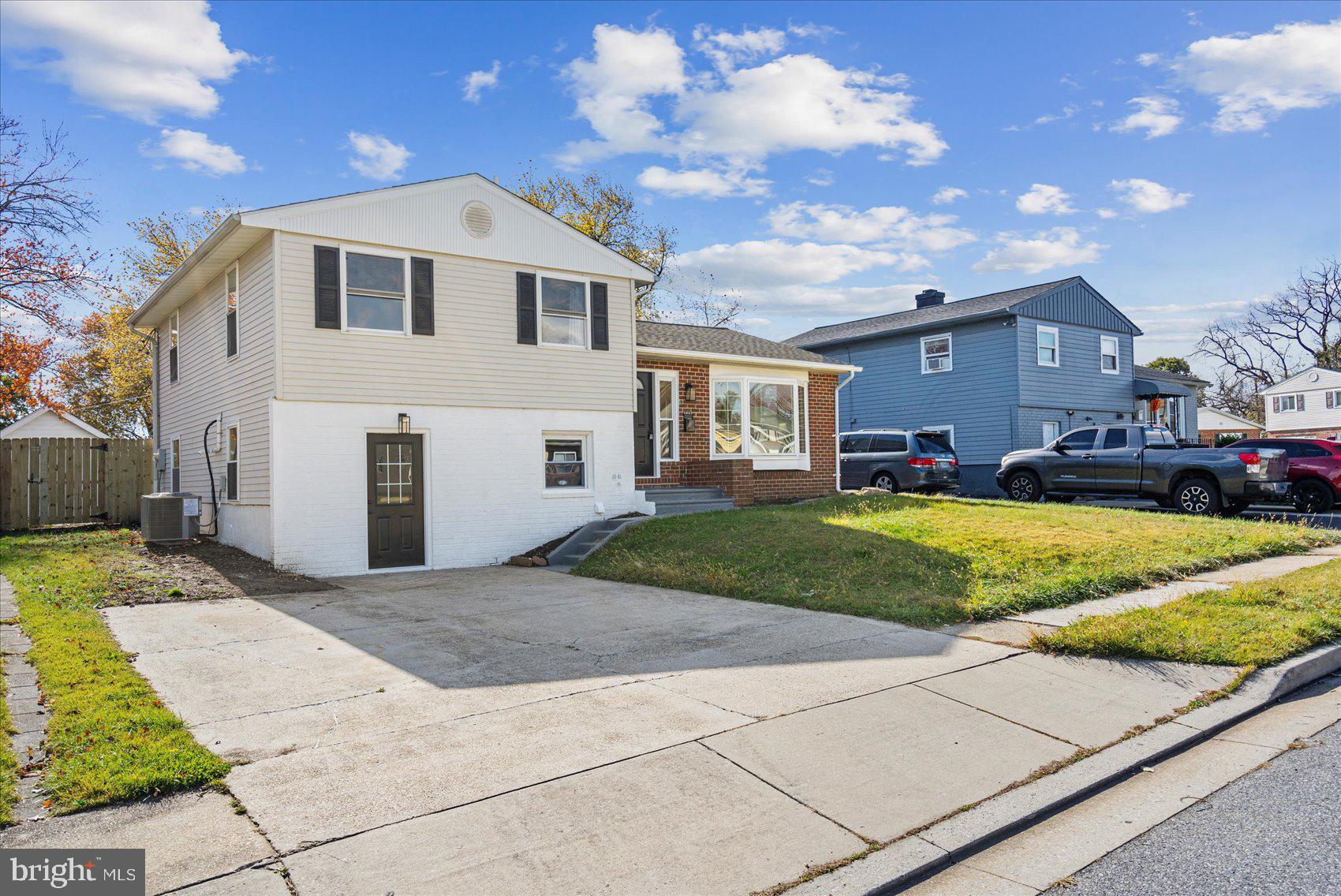 7803 Brevort Road Windsor Mill, MD 21244 - Photo 3 of 45 a front view of a house with a yard