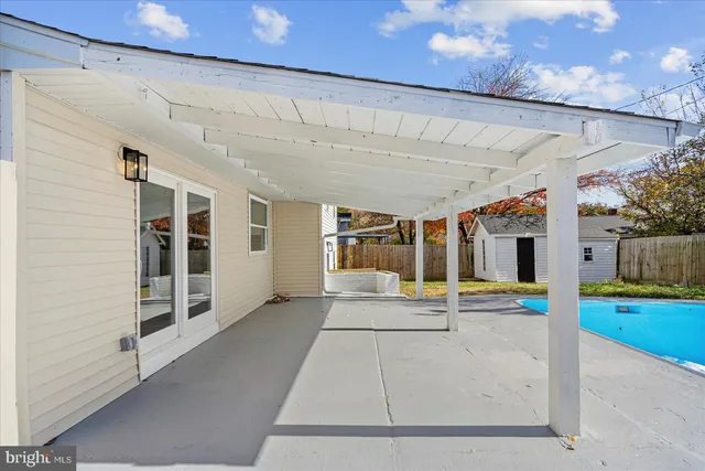 a view of a porch with seating space