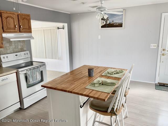 102 Bloomfield Road Barnegat, NJ 08005 - Photo 17 of 29 a view of a dining room with furniture and wooden floor