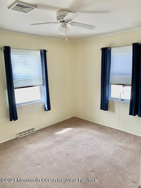 102 Bloomfield Road Barnegat, NJ 08005 - Photo 25 of 29 a view of an empty room with a window