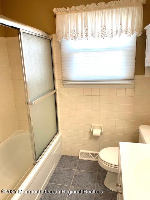 102 Bloomfield Road Barnegat, NJ 08005 - Photo 27 of 29 a white toilet sitting next to a shower