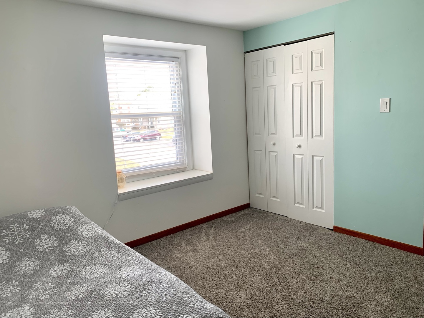 2231 Flower Court, Unit 2231 Schaumburg, IL 60107 - Photo 18 of 24 an empty room with windows