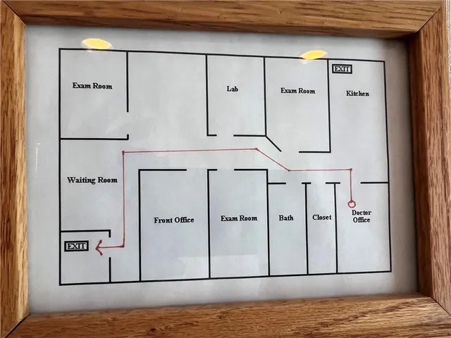 a view of kitchen with white cabinets