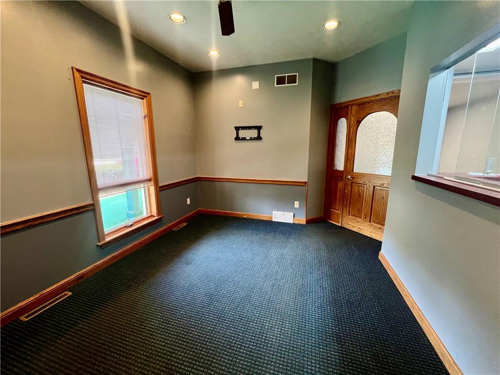 3121 Wilmington Road, Unit 2 New Castle, PA 16105 - Photo 4 of 12 a view of room with window and wooden floor