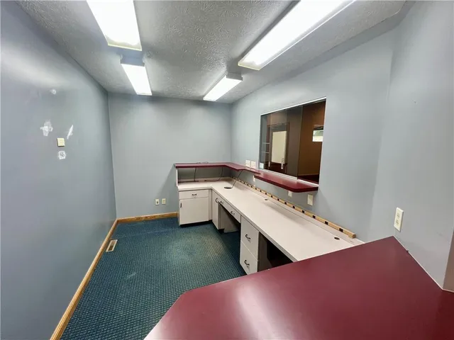 a view of a room with cabinets