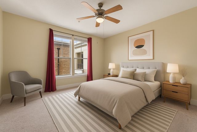 a bedroom with a bed and chair