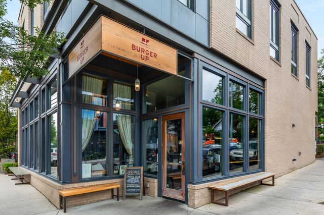 a view of shops in a street