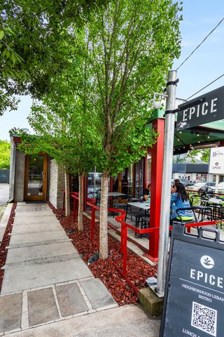 a view of a chairs and tables in the patio
