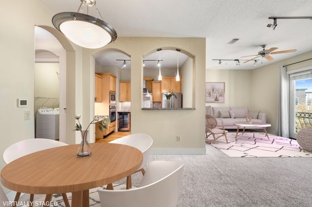 a living room with furniture and a table