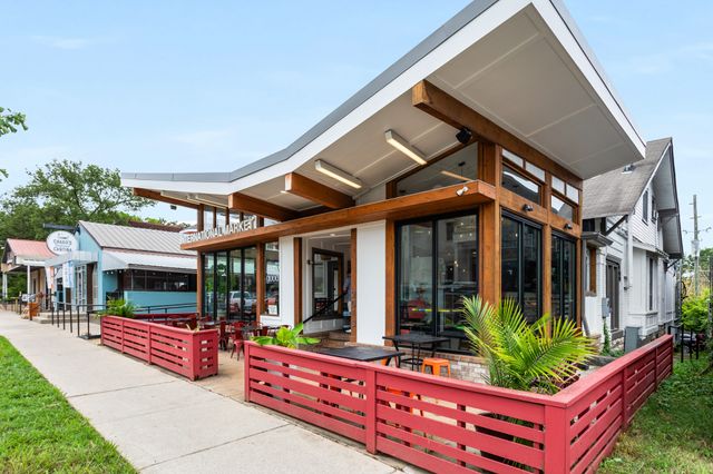 a view of an chairs and tables in the patio