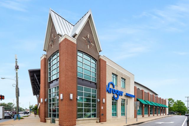 a front view of a building with street view