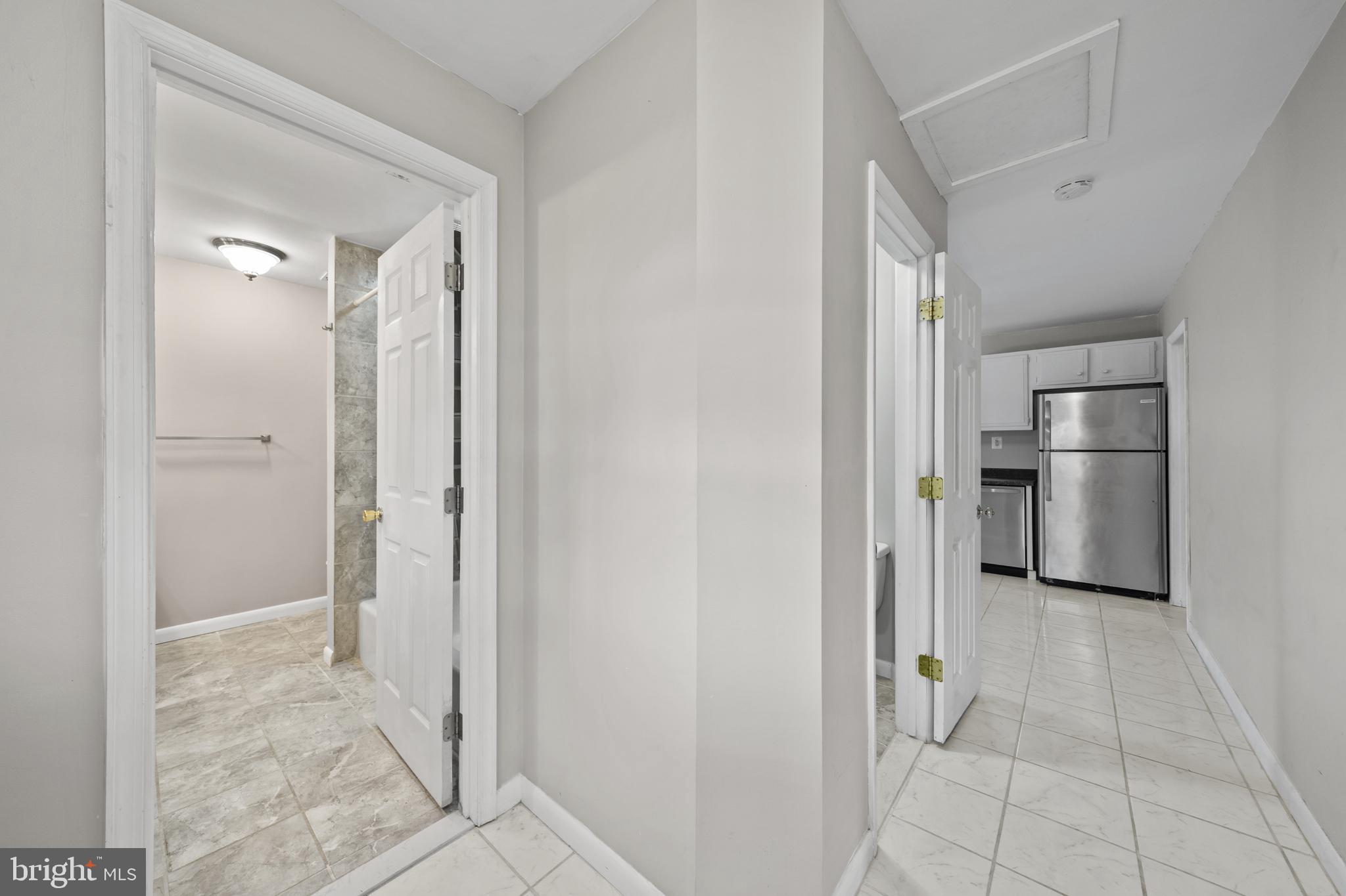 20350 Colton Point Road Coltons Point, MD 20626 - Photo 22 of 30 a view of a kitchen with a refrigerator and a sink