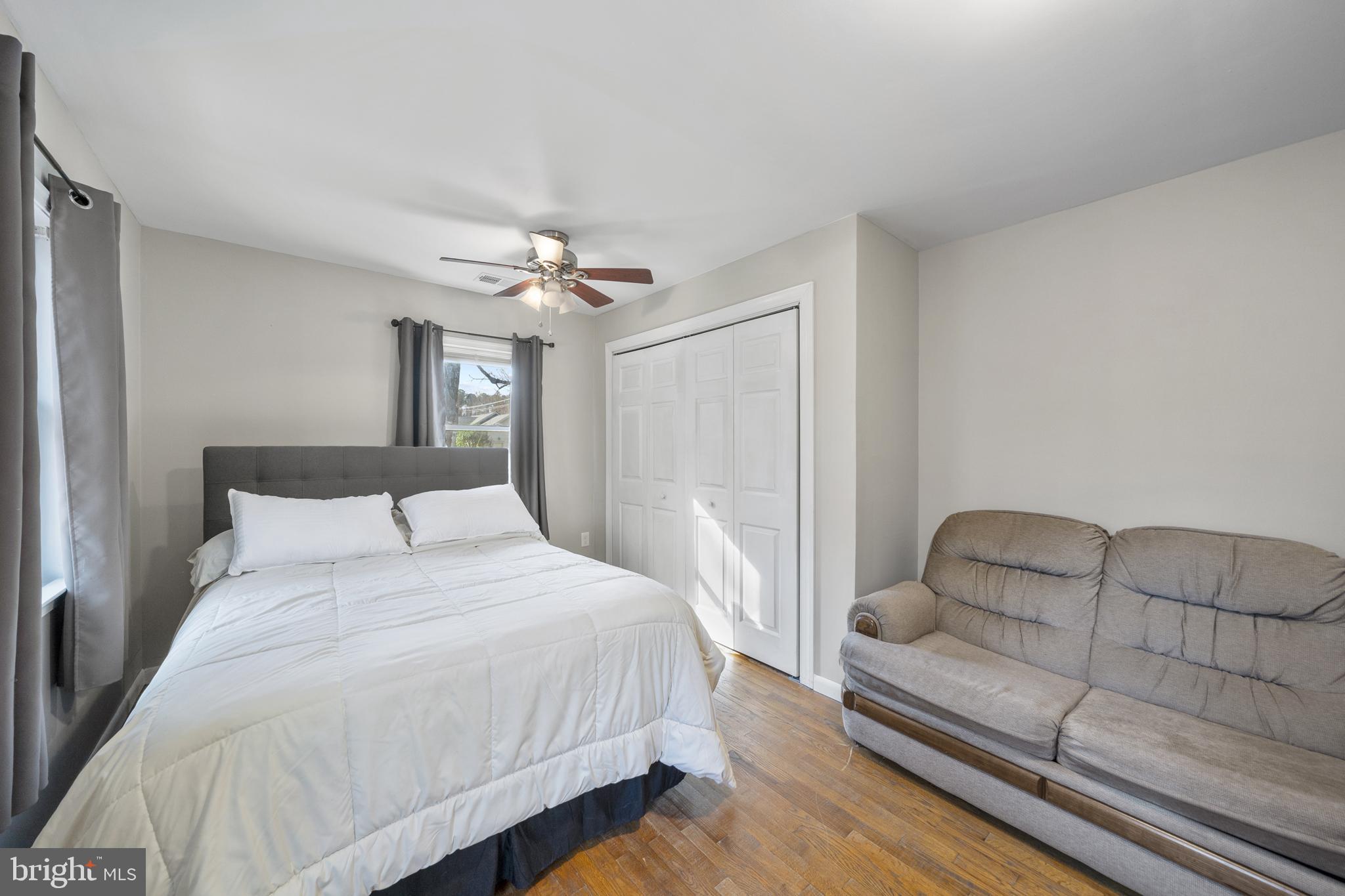 20350 Colton Point Road Coltons Point, MD 20626 - Photo 25 of 30 a bedroom with a bed furniture and a window