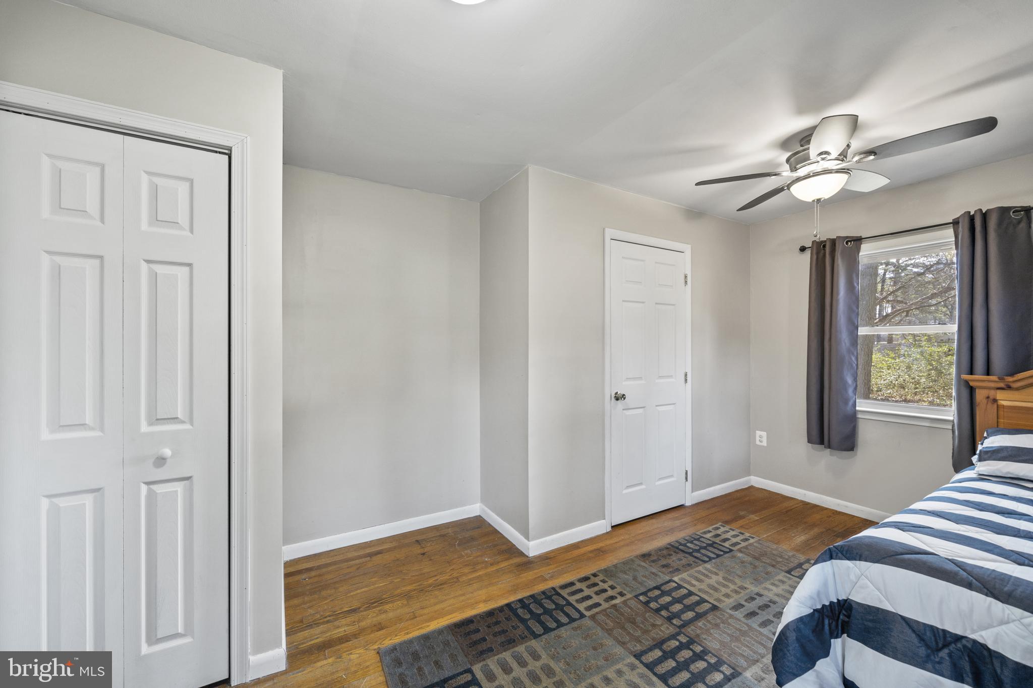 20350 Colton Point Road Coltons Point, MD 20626 - Photo 28 of 30 a bedroom with a bed and a window