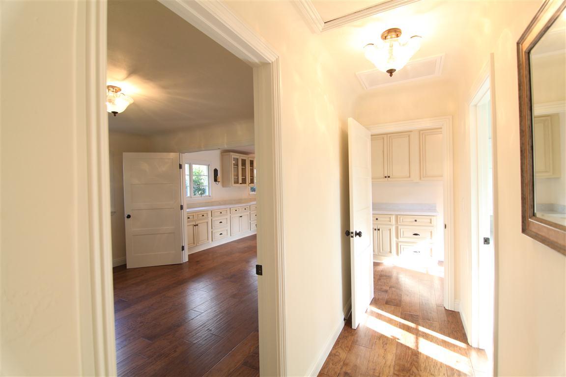 1183 Mesa Road Santa Barbara, CA 93108 - Photo 15 of 24 a view of a hallway with wooden floor