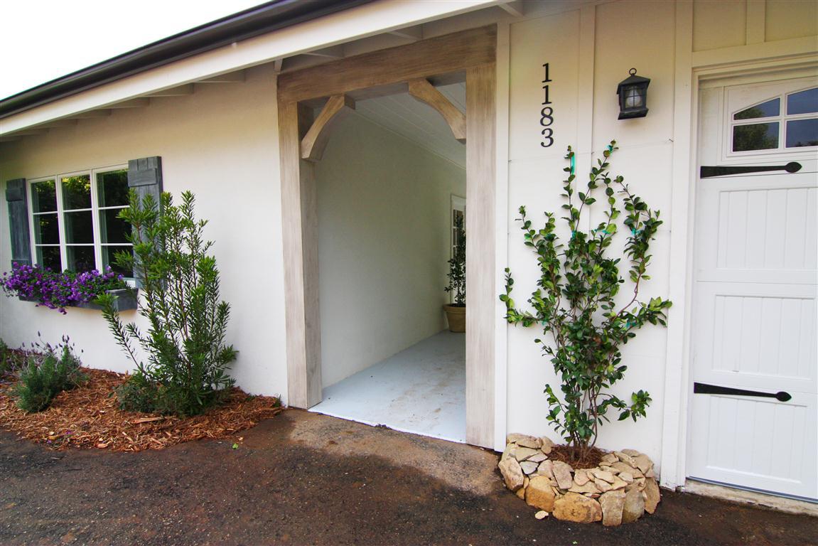 1183 Mesa Road Santa Barbara, CA 93108 - Photo 22 of 24 a potted plant sitting in front of a house