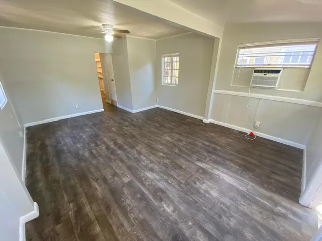 a kitchen that has a sink and a stove
