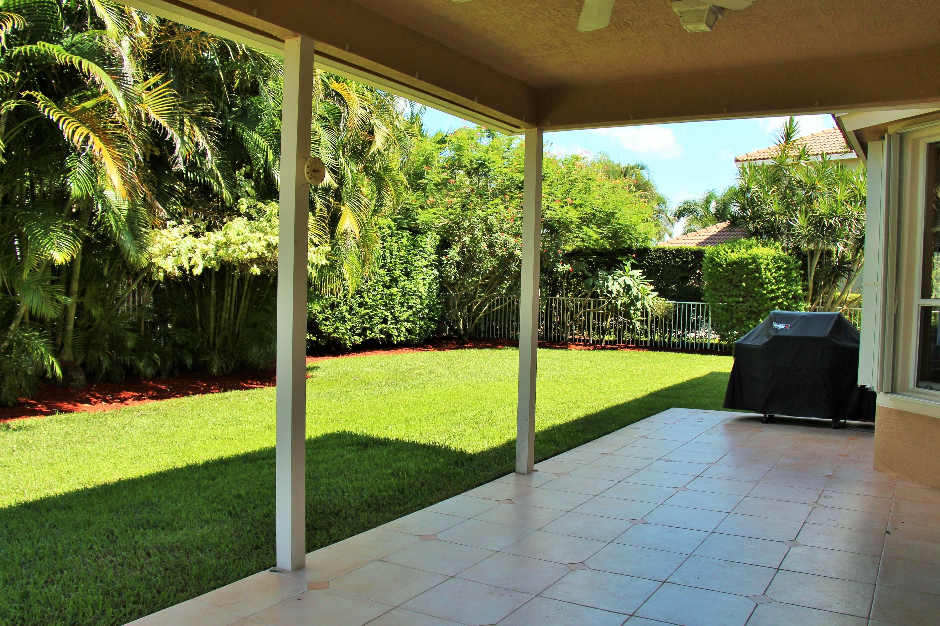 233 Sparrow Point Jupiter, FL 33458 - Photo 27 of 33 Back Patio - Yard