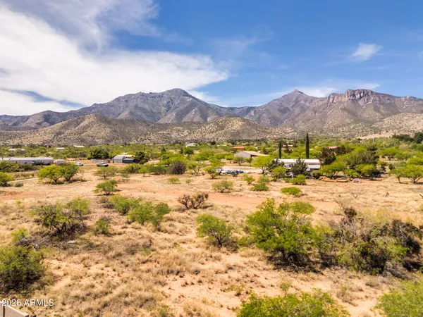 a view of ocean and mountains