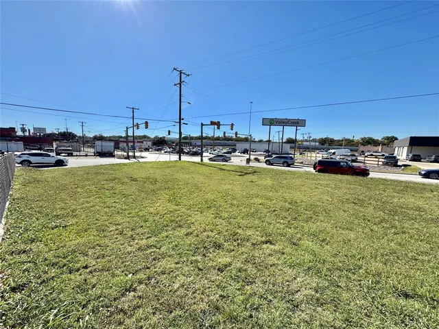 a view of a swimming pool with chairs
