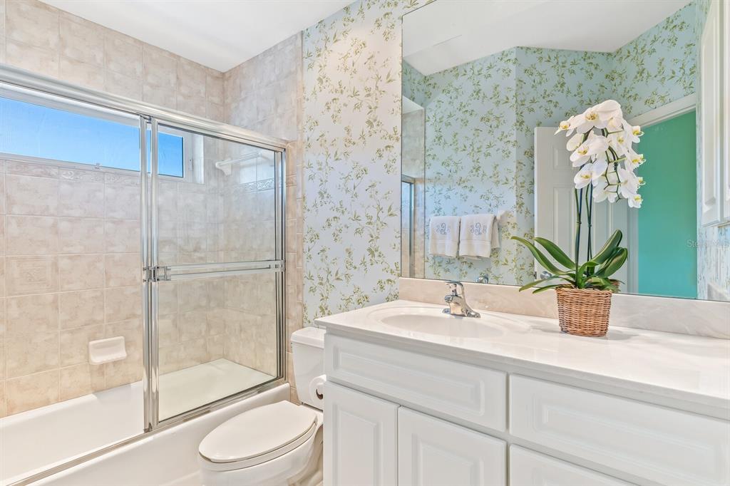 801 South Harbor Drive Boca Grande, FL 33921 - Photo 15 of 43 a bathroom with a sink a toilet and shower