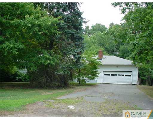 67 Harbor Road Morganville, NJ 07751 - Photo 1 of 1 a view of house and outdoor space