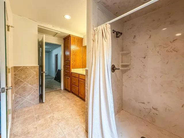 a bathroom with a sink and a bathtub