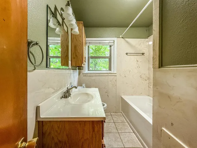 a view of a backyard with wooden floor