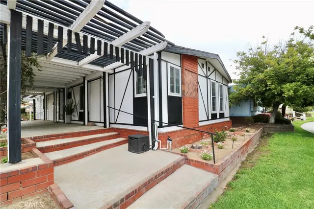 a backyard of a house with seating space