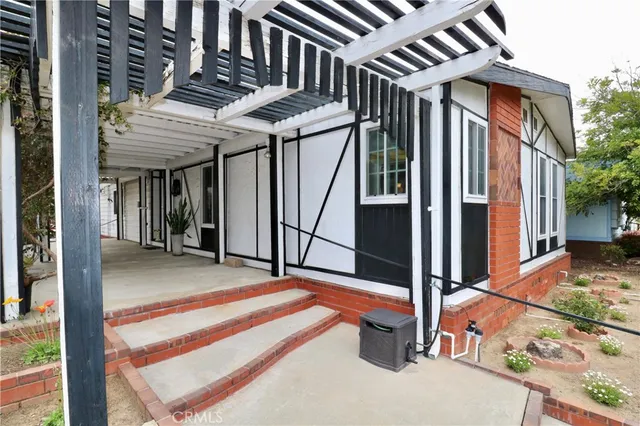 a view of an chairs in front of house