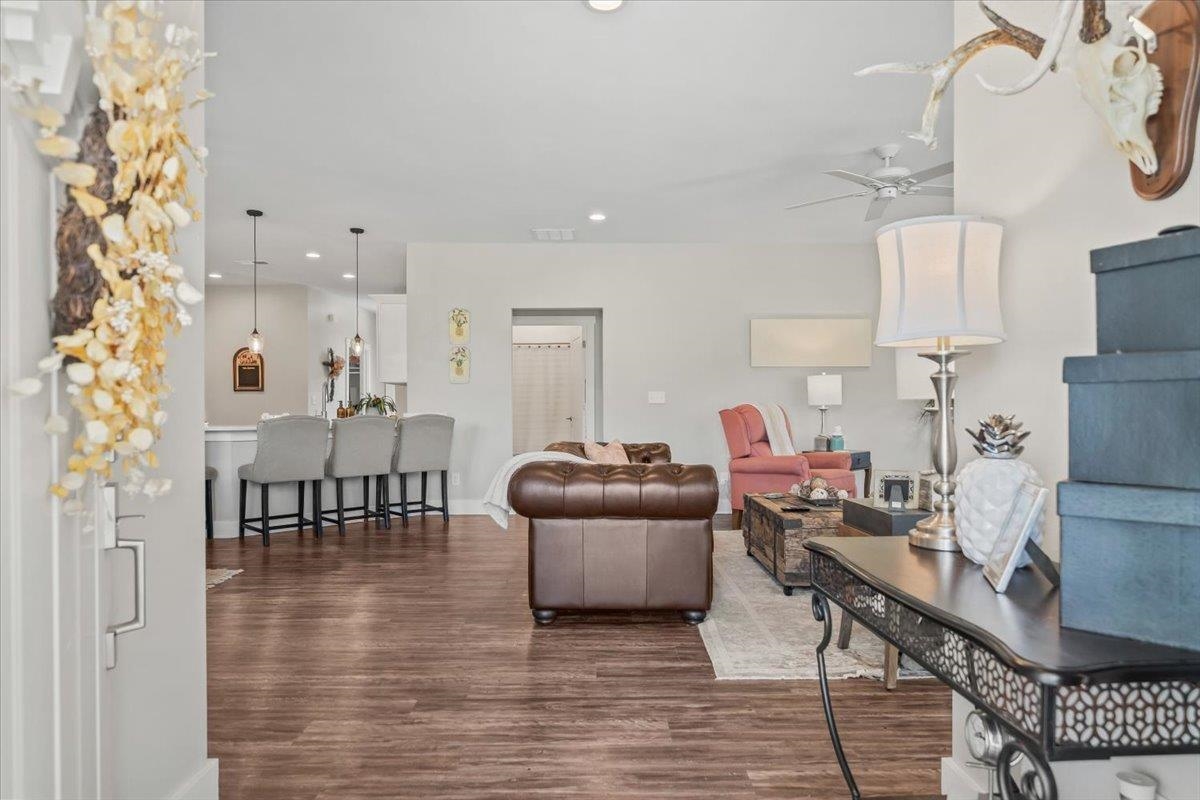 415 Abbey Road, Unit D Munford, TN 38058 - Photo 9 of 35 Open concept living area with wood-finish flooring