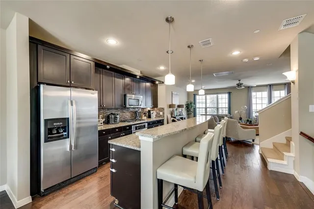 a view of house with a big yard