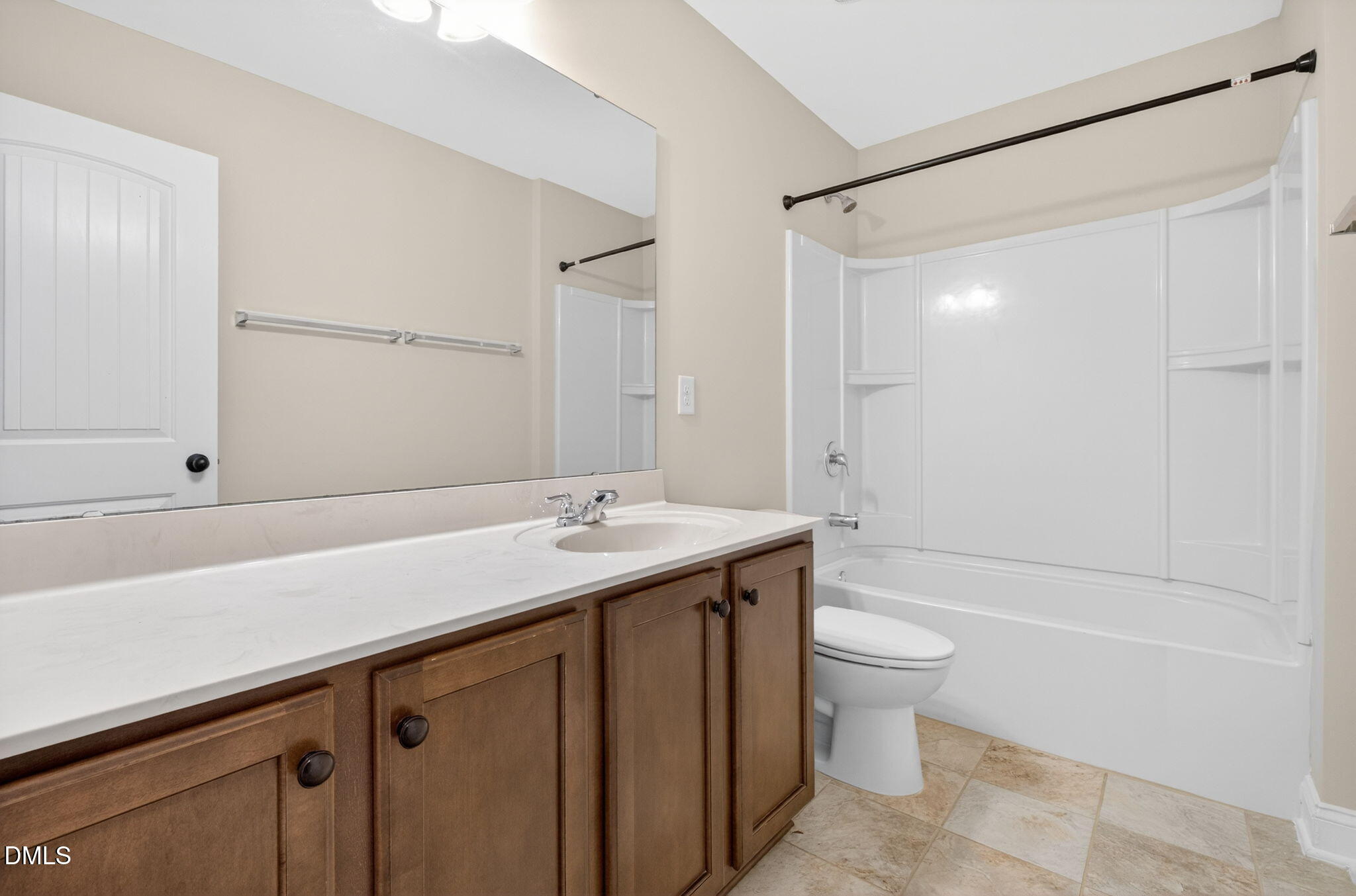 1304 Barnford Mill Road Wake Forest, NC 27587 - Photo 30 of 44 a bathroom with a sink a toilet and shower