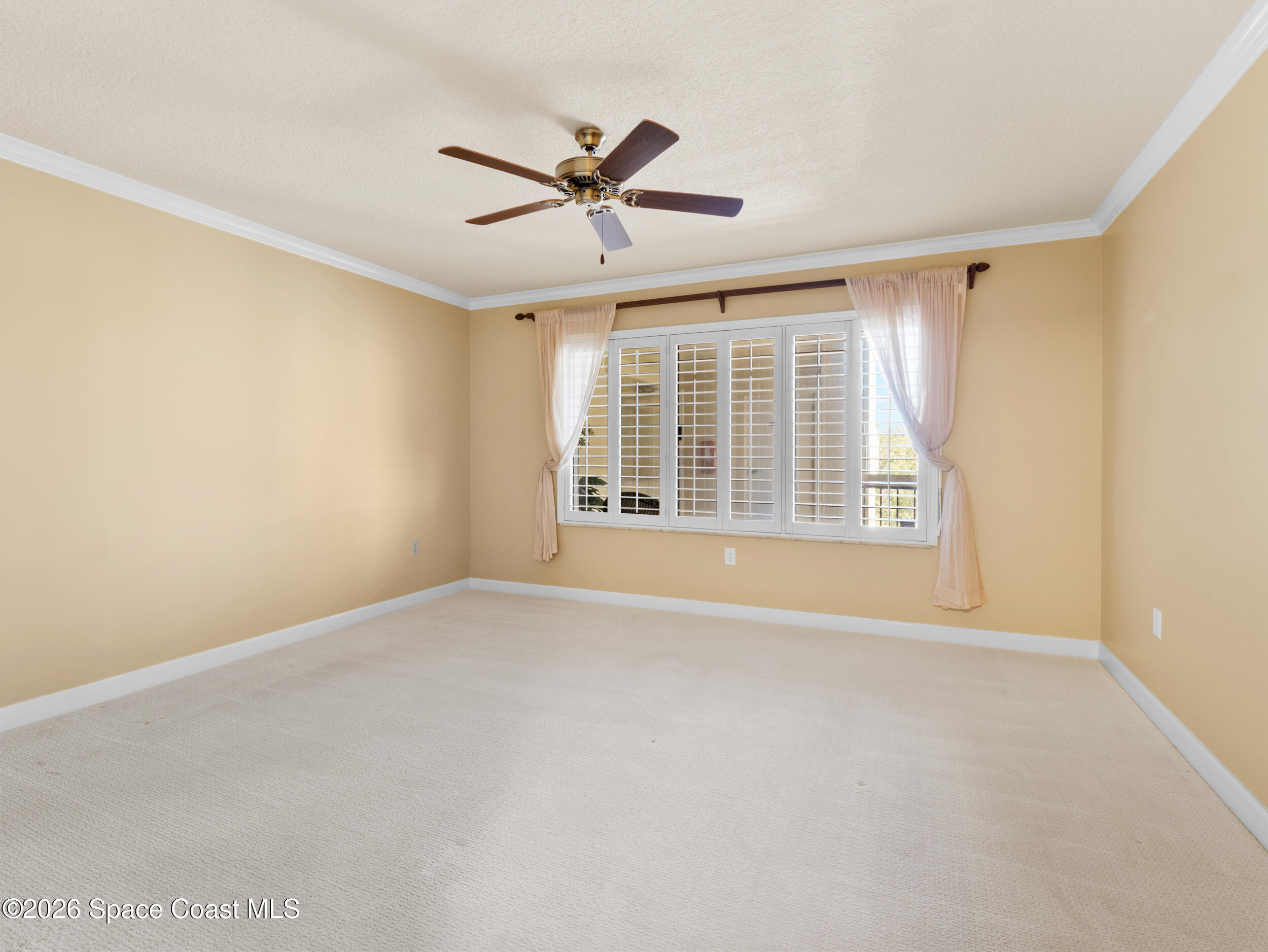 2220 Front Street, Unit 303 Melbourne, FL 32901 - Photo 10 of 42 a view of an empty room with a window