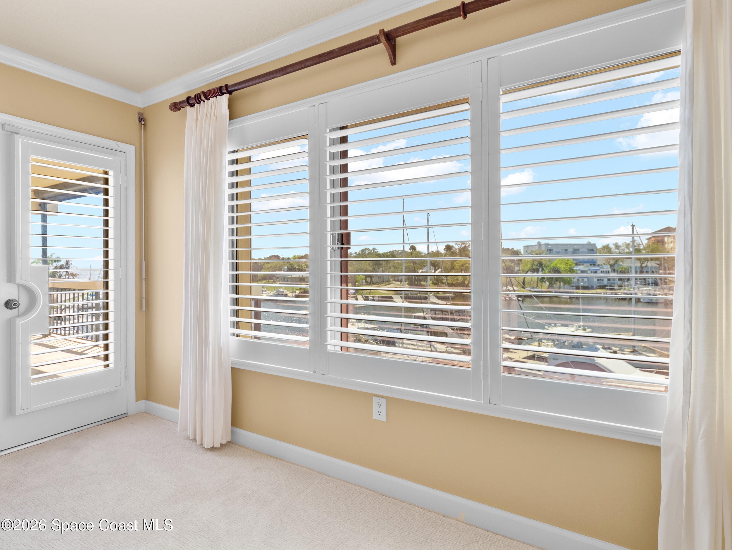 2220 Front Street, Unit 303 Melbourne, FL 32901 - Photo 23 of 42 a view of a room with a large window