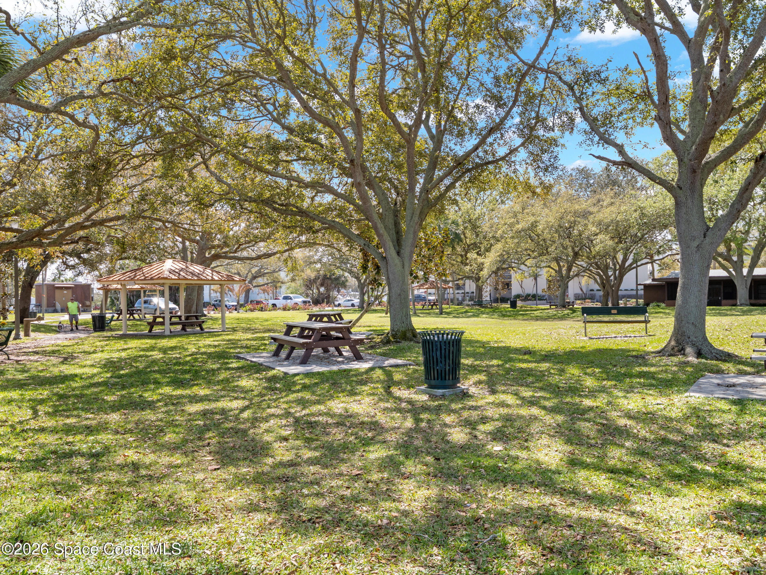 2220 Front Street, Unit 303 Melbourne, FL 32901 - Photo 39 of 42 a view of a house with a yard patio and fire pit