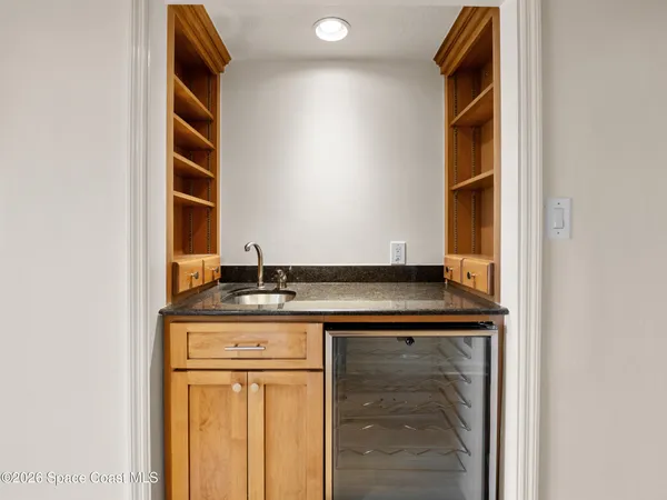 a bedroom with a bed and furniture