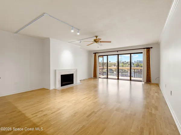 a kitchen with granite countertop cabinets stainless steel appliances and a counter space